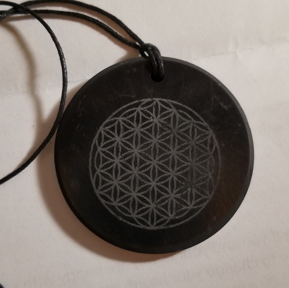 Beautiful black Shungite pendants of flowers